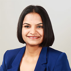 Headshot of Shruti Sonthalia, MCC and Foundation Council Ambassador with the International Coaching Federation. Known for her authentic transformative conversations for decision-makers in family businesses, where emotion and passion are high.  