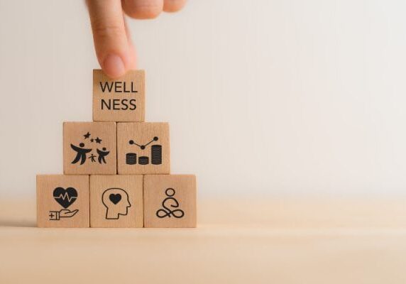 blocks stacked in a pyramid shape depicting various wellness icons