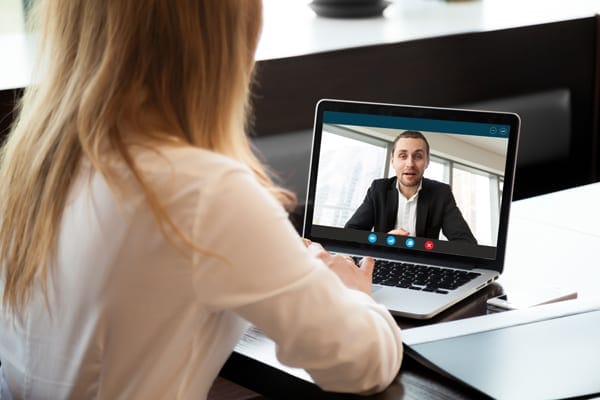woman on video conference with a man