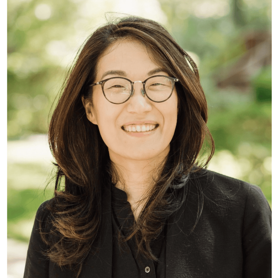 Haesun Moon headshot photo, smiling woman with dark hair wearing dark shirt outside